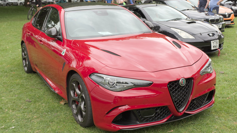 A red Alfa Romeo Giulia Quadrifoglio at the Nottingham Motor Show 2026.