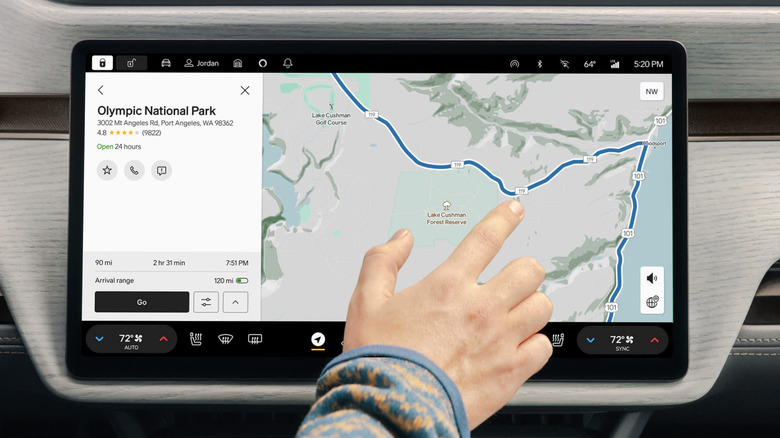 A Rivian R1T infotainment screen opened to maps.