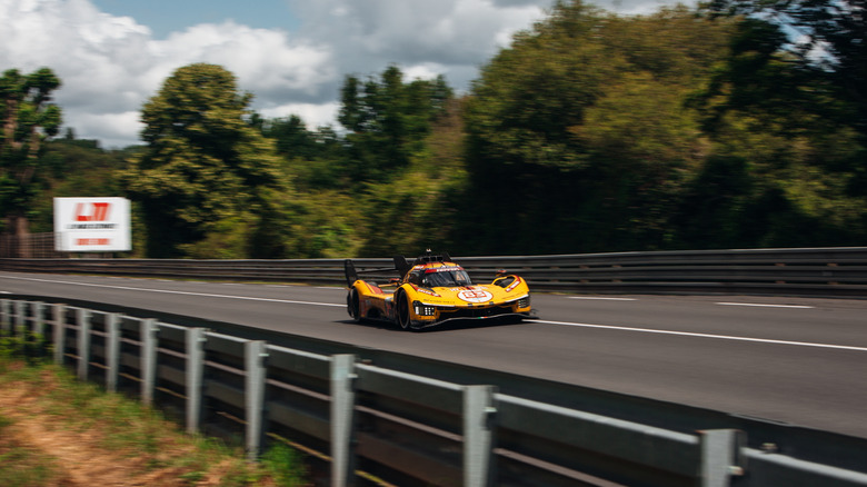 The no. 83 Ferrari 499P hypercar on the Circuit de la Sarthe during 2025 24 Hours of Le Mans.