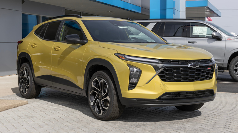 Front 3/4 view of a yellow Chevy Trax