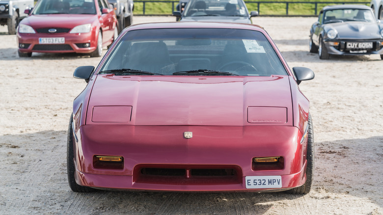 Chester, Cheshire, England, March 8th 2025. A red Pontiac Fiero GT is displayed at the Chester Classic Car Auction.