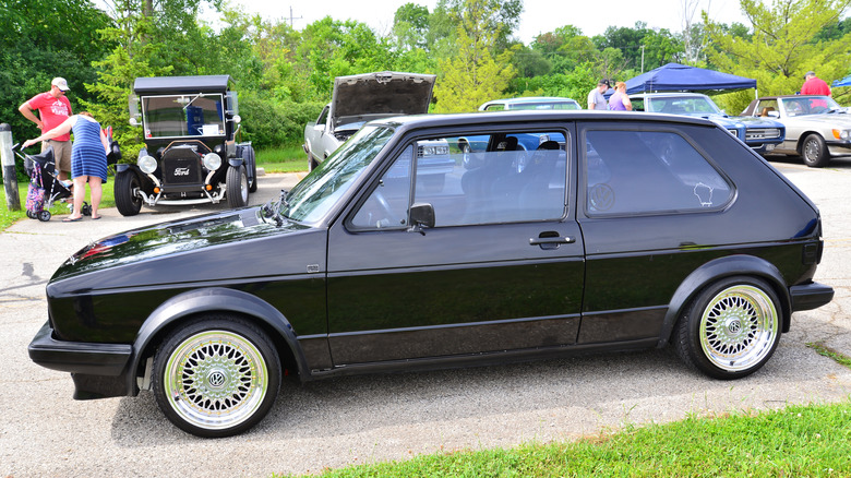 Norway, Wisconsin / USA - June 30, 2019: The Volkswagen VW GTI was produced from 1985 to 1992 in this type of body style. This black car is displayed at the annual Wind Lake Car Show.