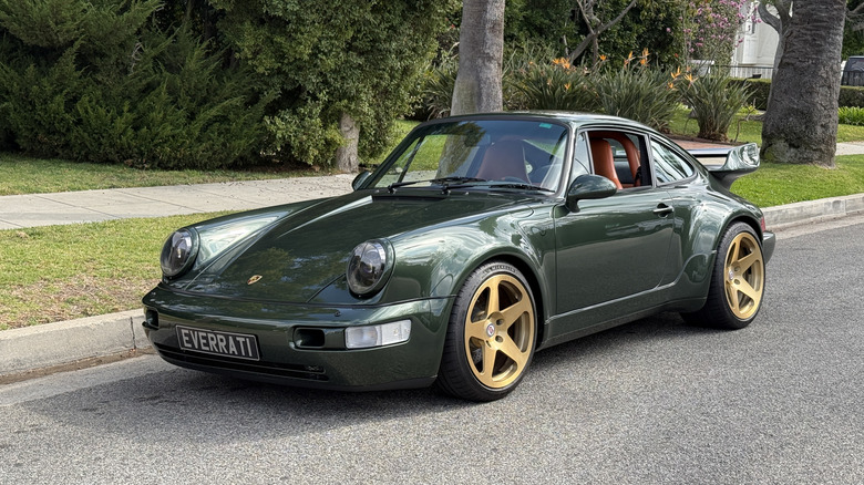 Front 3/4 view of the green Everrati Porsche 964 RSR