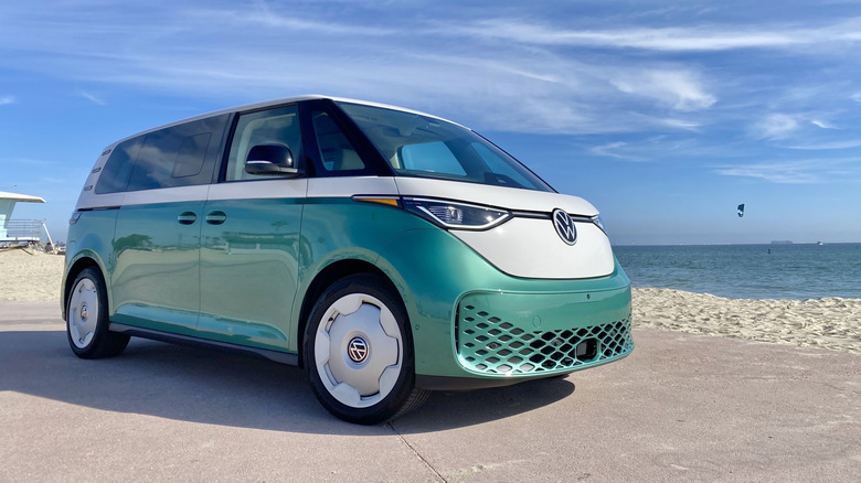 Front 3/4 view of a white and green Volkswagen ID Buzz