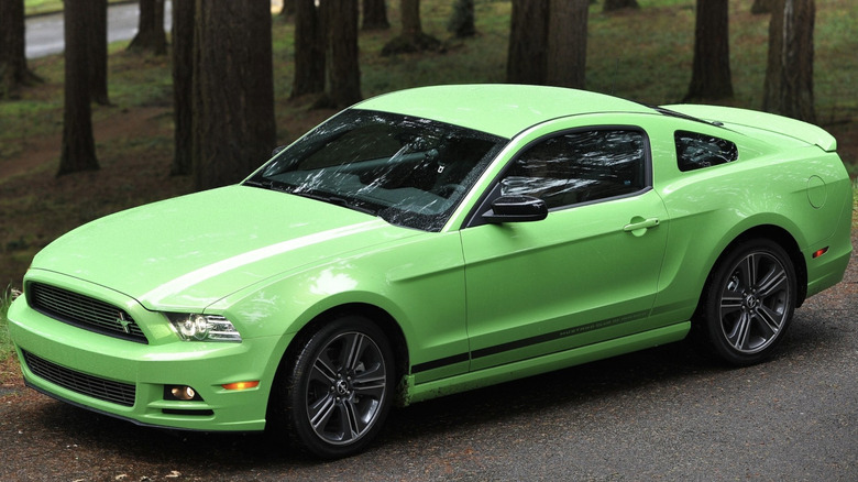 a lime greenish ford mustang