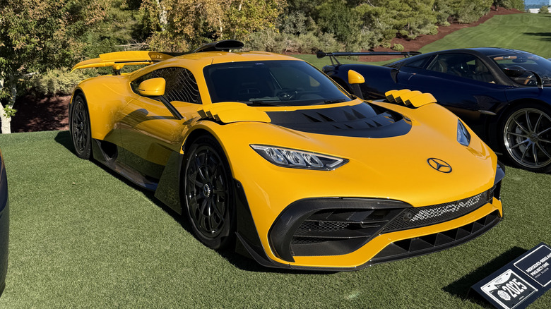 Front 3/4 view of a yellow Mercedes-AMG One