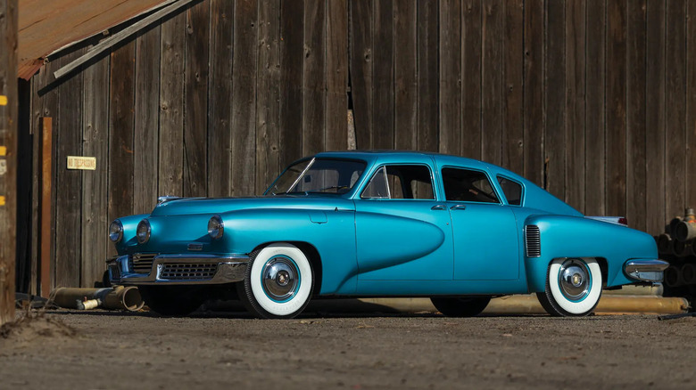 Front 3/4 view of a teal Tucker 48