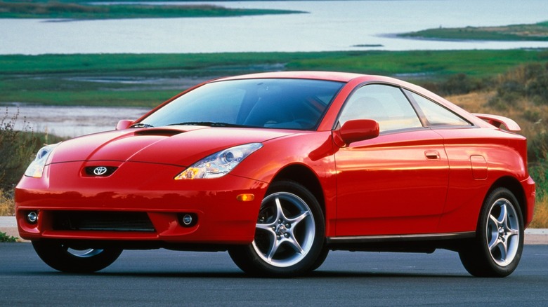 Front 3/4 view of a red Toyota Celica