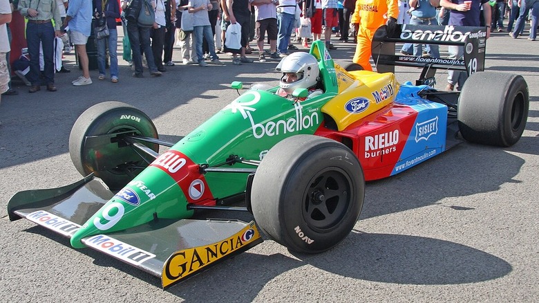 The 1988 Ford Benetton B188 Car Sporting its yellow, red, green, and blue livery at Goodwood's Festival of Speed in 2009.