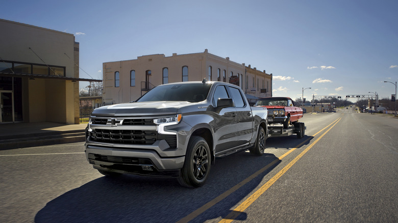 Chevy Silverado towing a car