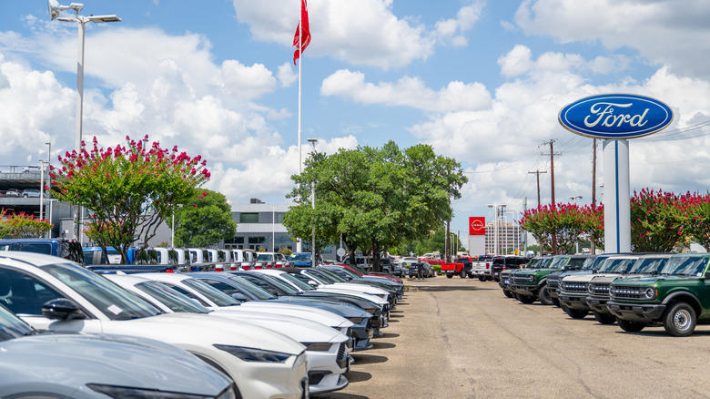 AUSTIN, TEXAS - JUNE 24: Ford Mustang Mach-E vehicles are seen for sale on a dealership lot on June 24, 2025 in Austin, Texas. Ford Motor is recalling more than 197,000 Mustang Mach-E vehicles after a malfunction with the door latches has surfaced according to the National Highway Traffic Safety Administration