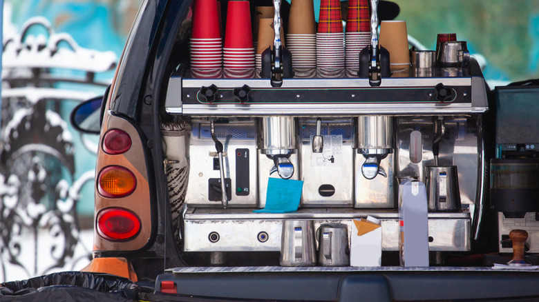 car with coffee machine in the street