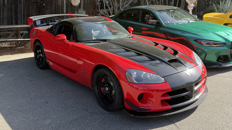 Front 3/4 view of a black and red Dodge Viper ACR