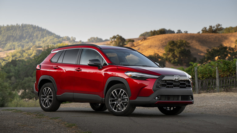 A red 2026 Toyota Corolla Cross that looks almost like the Mitsubishi Eclipse Cross and they all look the same.