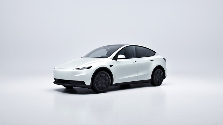 A white Tesla Model Y on a white background that looks almost identical to the white Tesla Model 3 photo used later in this slideshow.