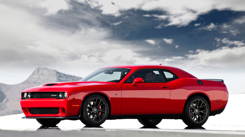 Challenger parked in front of clouds