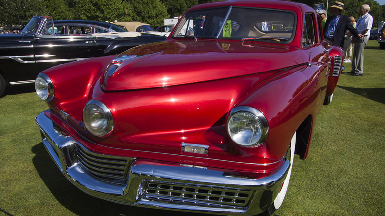 A red Tucker on the golf green for the Concours d'Elegance show in 2015.