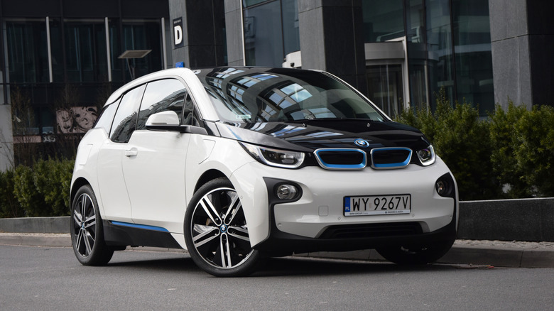 Warsaw, Poland - April 4th, 2015: Hybrid BMW i3 stopped on the street during the test drive. The BMW i3 was debut in 2013. The car body of this vehicle is constructed with carbon fiber, aluminium and special plastic. That's why the BMW i3 is very light with compare with rivals.