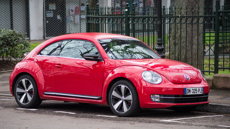 Mulhouse - France - 19 January 2020 - Front view of red Volkswagen new beetle Parked in the street