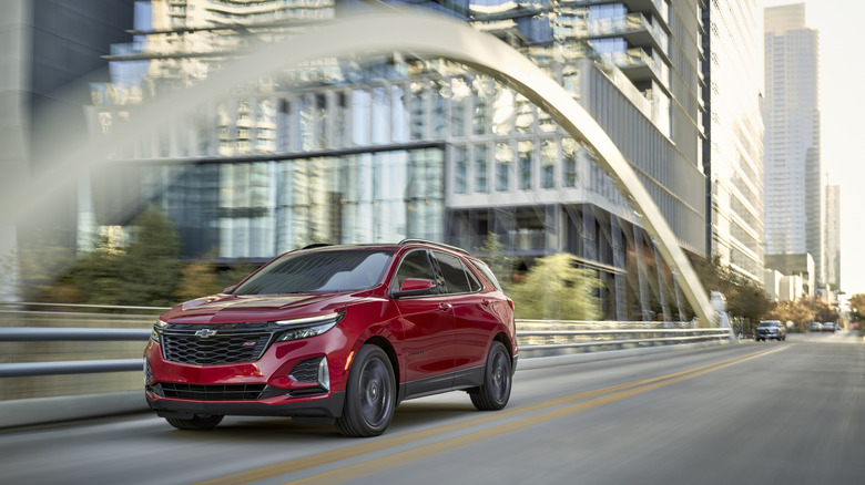 A red 2024 Chevrolet Equinox RS