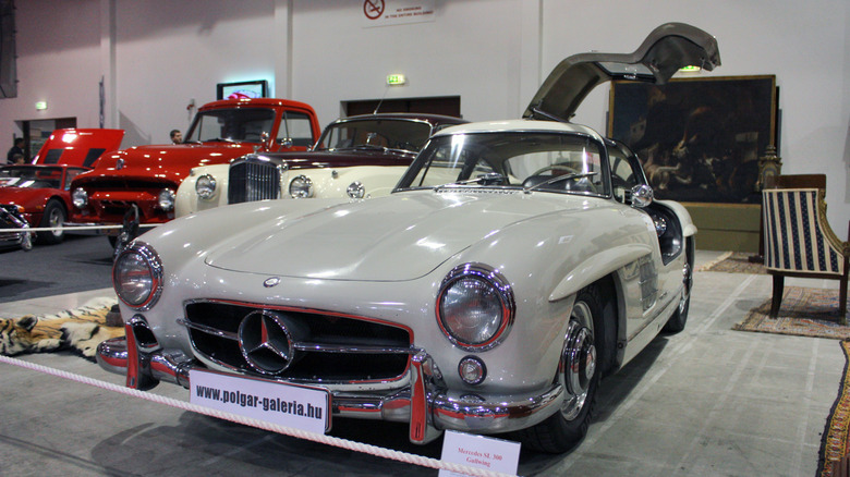 A white Mercedes SL400 Gullwing