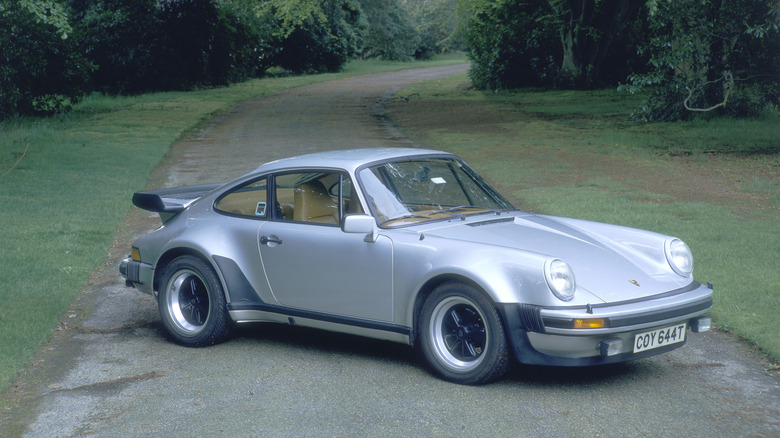 1979 Porsche 911 Turbo. A development of the previous 3 litre version, these 3.3 litre-engined cars could easily reach 160 mph and produced over 300 hp. (Photo by National Motor Museum/Heritage Images/Getty Images)