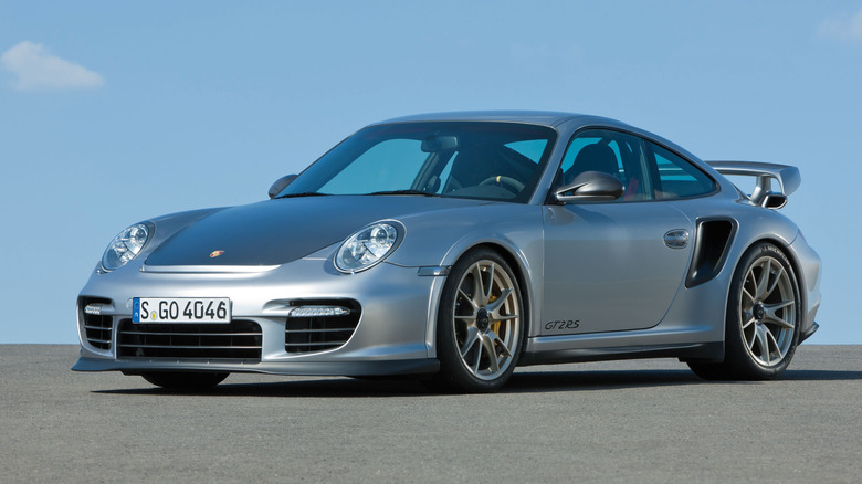 Front 3/4 view of a silver Porsche 911 GT2 RS