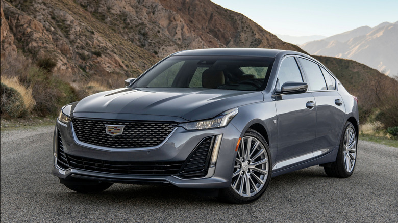 A cadillac CT5 parked in the mountains
