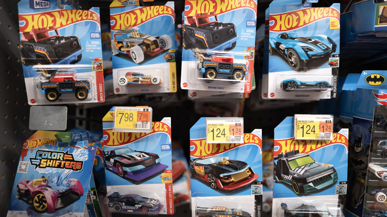 a wall of hot wheels toys