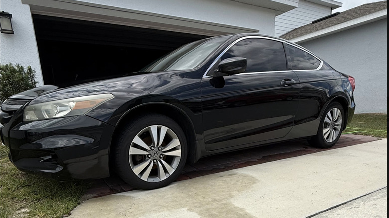 Used 2012 Honda Accord LX-S Coupe 2D FWD parked in sideways across the entrance of a garage