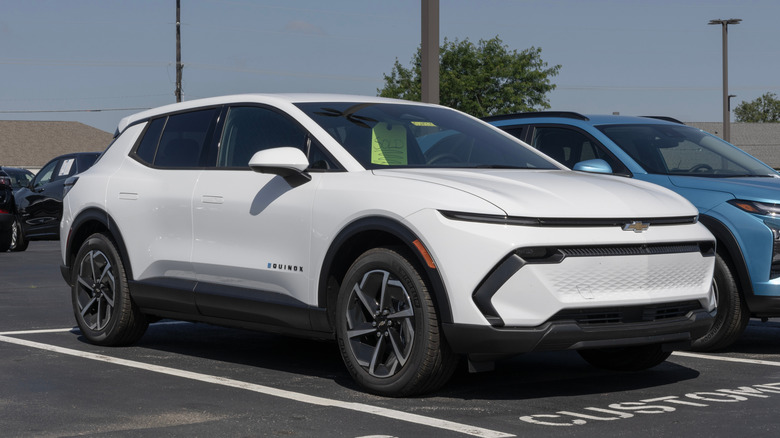 Avon - June 22, 2025: Chevrolet Equinox EV LT Electric SUV display. Chevy offers the Equinox EV with up to 319 miles of driving range. MY:2025