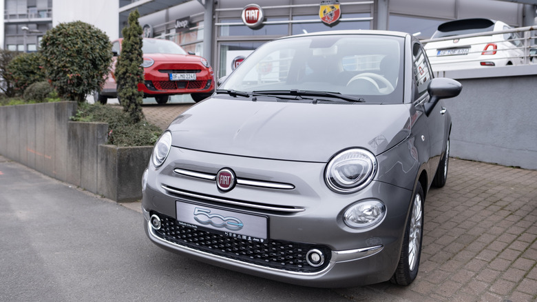grey Electric Fiat 500 E classic Hatchback car parked in parking lot, automotive passion, Italian car manufacturer Fiat Group, Innovation automotive industry in Frankfurt, Germany