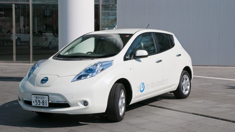 "Yokohama, Japan - February 22, 2011:A Nissan's electric car ""Nissan Leaf"" is parked at the entrance of the company's global headquarters located in Yokohama, Japan."