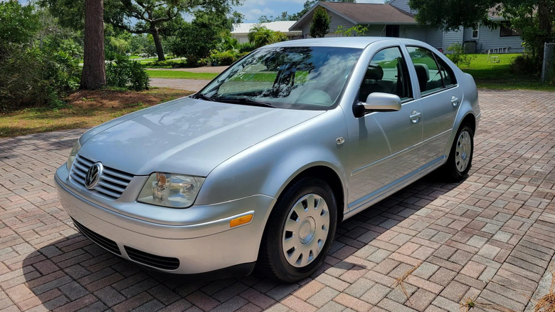 A silver 2003 Volkwagen Jetta GL TDI sitting on a brick driveway. Not the poster's car.