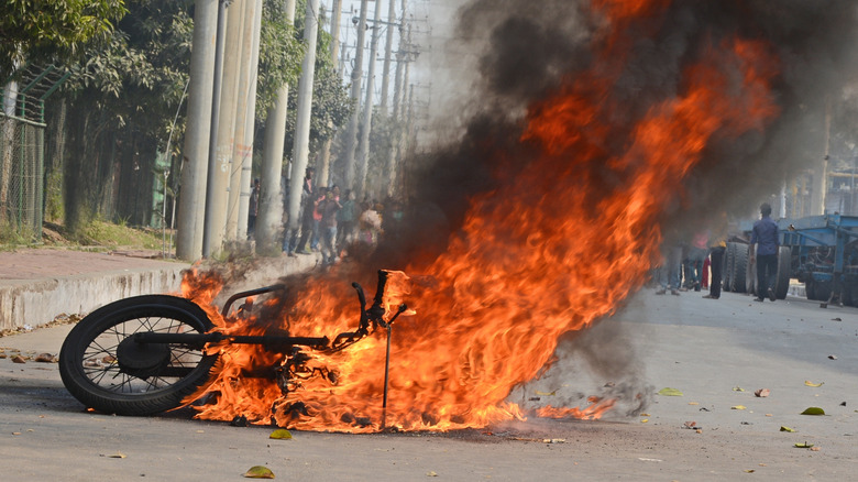 Not the actual bike on fire, but an image of a bike on fire in the street.