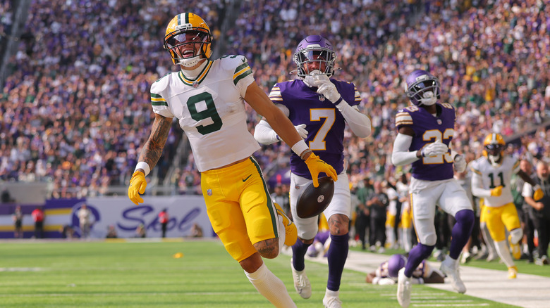 MINNEAPOLIS, MINNESOTA - SEPTEMBER 13: Christian Watson #9 of the Green Bay Packers scores a touchdown during the first quarter against the Minnesota Vikings at U.S. Bank Stadium on September 13, 2026 in Minneapolis, Minnesota. (Photo by Adam Bettcher/Getty Images)