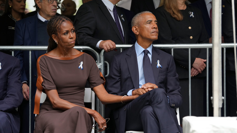 NEW YORK, NEW YORK - SEPTEMBER 11: From left: Former First Lady Michelle Obama and Former President Barack Obama attend the 9/11 25th anniversary commemoration ceremony at the National 911 Memorial and Museum in New York on September 11, 2026, in New York City. The United States is marking the 25th anniversary of the terrorist attacks of September 11, 2001, when a group of al-Qaeda hijackers flew airplanes into the World Trade Center, Shanksville, Pennsylvania, and the Pentagon, killing nearly 3,000 people. (Photo by Hiroko Masuike - Pool/Getty Images)