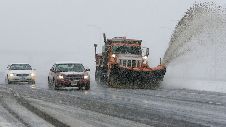 Cars drive through snow in Billings, Montana