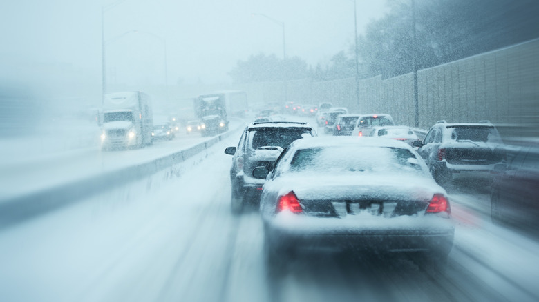 Winter Storm Traffic. I-294 Chicago Highway During Snow Storm. Heavy Snowfall and Heavy Traffic.