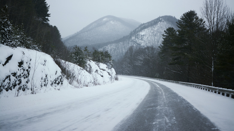 Snow Covered Vermont Road With Hills And Mountains In Background Castleton Vermont