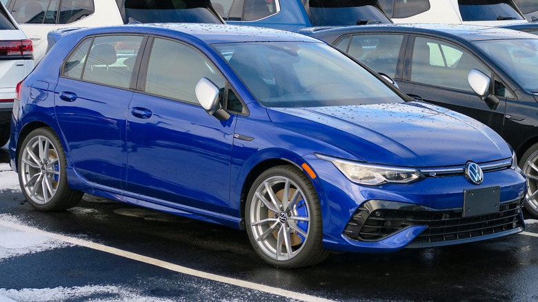 A blue 2024 Volkswagen Golf R photographed in Sault Ste. Marie, Ontario, Canada.