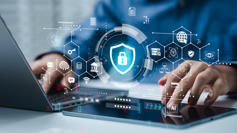 Cyber security and Data protection concept, Businessman using laptop computer with Lock icon on internet network security technology. Cybersecurity and privacy management on cloud computing