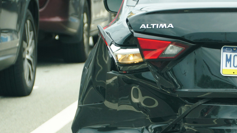 The crushed rear of a Nissan Altima