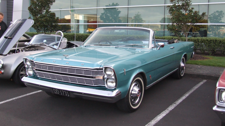A blue 1966 Ford Galaxie in a parking lot