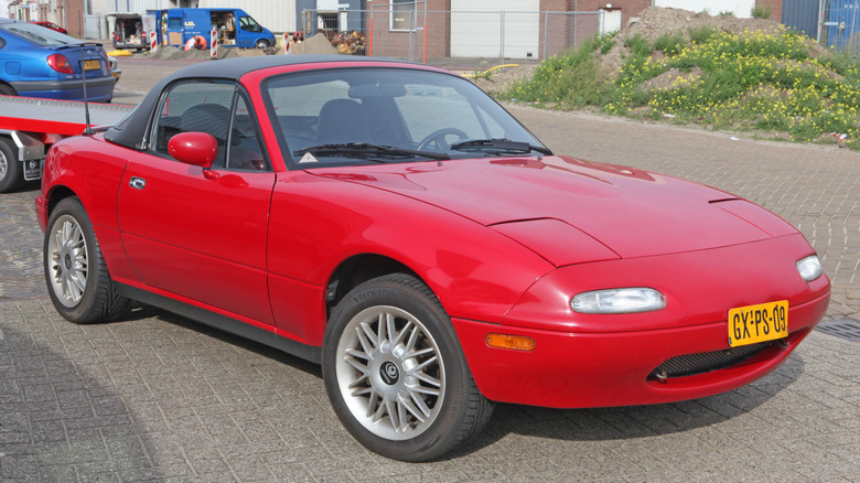 A red 1992 Mazda MX-5 Miata