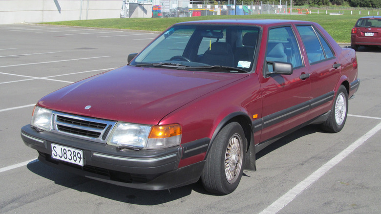 A dark red 1993 Saab 9000 CD