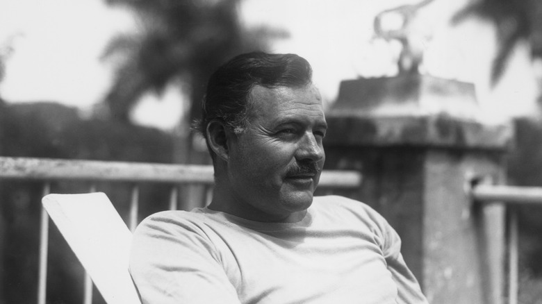 a black and white photo of ernest hemingway
