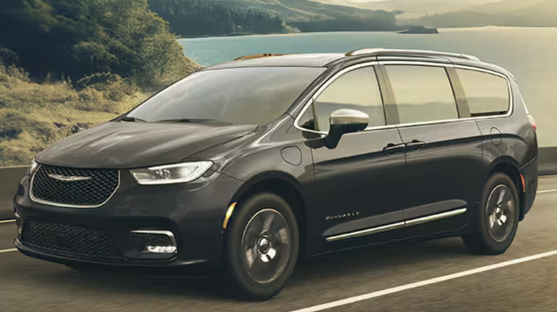 A Chrysler Pacifica Hybrid parks near water.