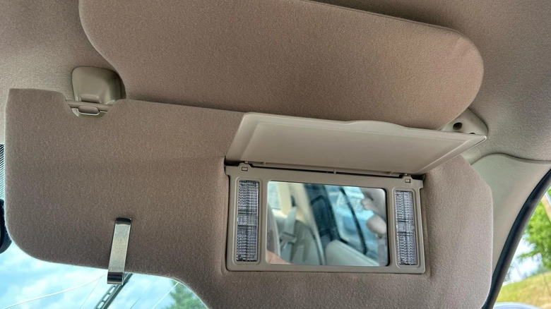 Behold, the glory that is the two sun visor setup offered in many Ford products in the early aughts.