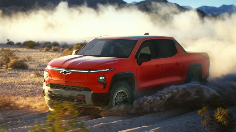 2-26 Chevy Silverado EV driving fast on dirt road